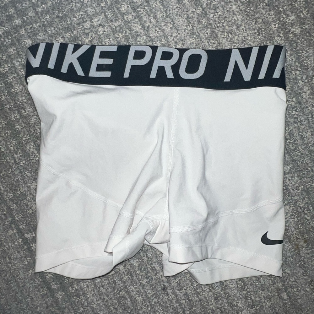 white nike pros size M